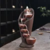 porte encens cascade
