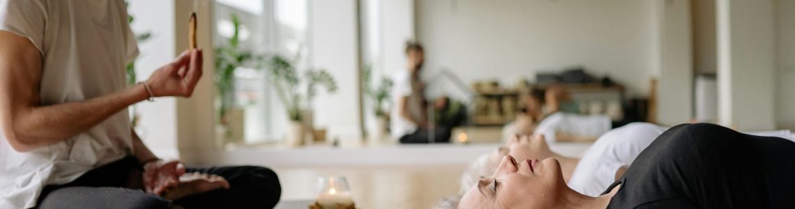 pexels-photo-8436500-8436500 Yoga and meditation session in a serene studio with incense and relaxation.